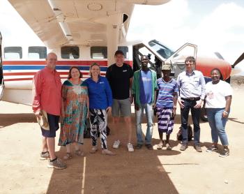 From left to Right: Eddy and Amanda Simmons, Kristina of MAF International and Peter, the MAF Denmark CEO, Pastor Francis, Suruai, MAF Pilot Christiaan and Jacqueline, the Communications Officer MAF Kenya  at Sesia airstrip.