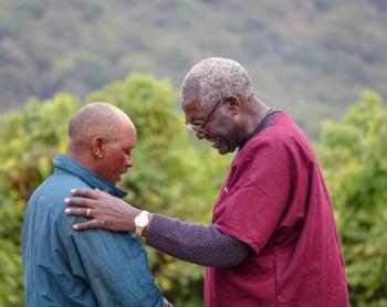 Dr. Mandieka Engages in Prayer with Maasai Man Embracing Christianity