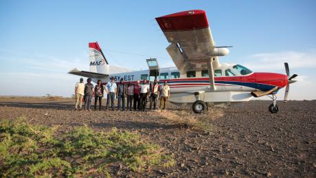 MAF Pilot Daniel Loewen-Rudgers with CURE medical team and Missions of Hope team