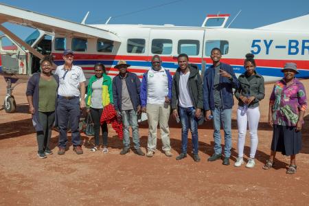 Pilot Daniel with a team of medics, vets and a MAF staff at Kalama Airstrip in Samburu County.