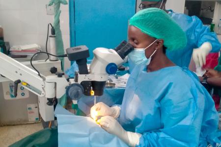 Ophthalmologists performing sight restoring surgeries during the clinic
