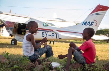 Children at the airstrip in LogLogo