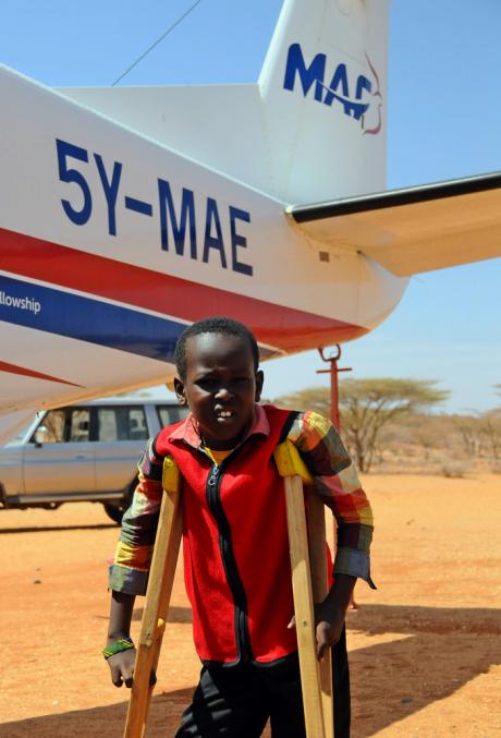 MAF flow a disabled child to the clinic for his post surgery check up