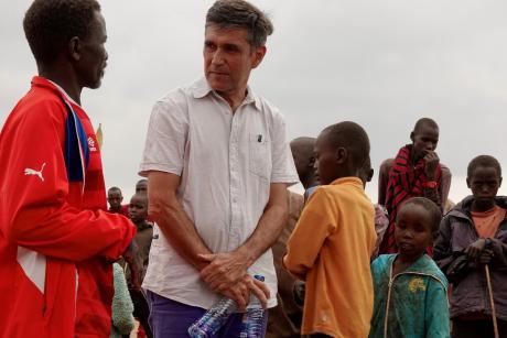 Leon having a conversation with Daniel, a RedTribe staff at the Enairebuk airstrip, Kenya.