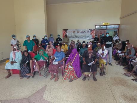 Patients are seated in the post-surgery waiting area.