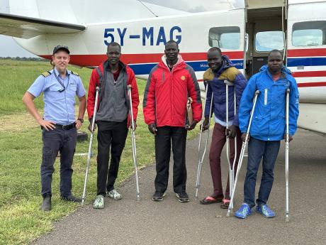 The three patients safely return to Juba with Pilot Matt Marples after successful surgeries and are now in the recovery phase.