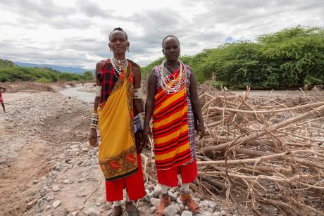 Toron on the left and Letoi standing next to where their home was before it was swept away by floods. ~ Photo credit: Jacqueline Mwende